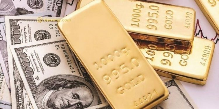 Vàng giảm khi Fed báo hiệu một đợt tăng lãi suất sớm hơn dự kiến