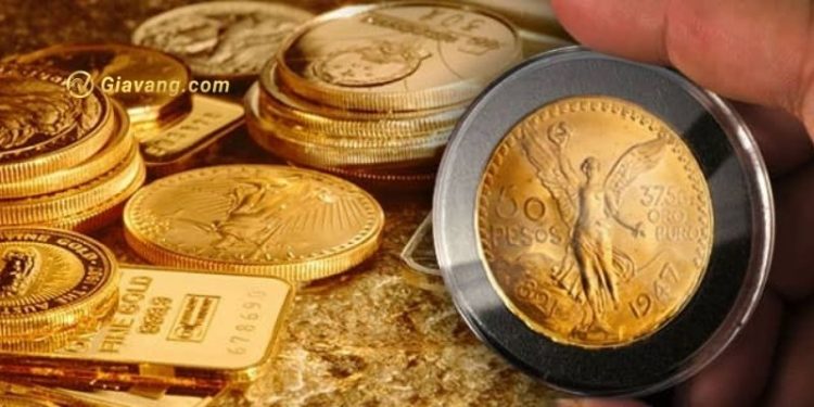 Vàng giảm xuống thấp hơn khi đồng USD tăng