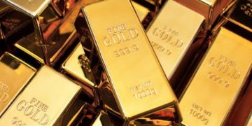 Giá vàng thấp hơn và duy trì quá mua