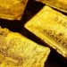 Vàng (20/12) đạt mức cao trong 3 tuần do biến thể Omicron