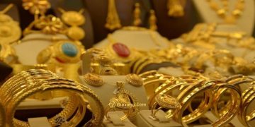 Vàng (14/3) giảm khi lợi suất tăng