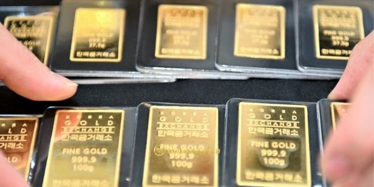 Vàng (22/3) giảm giá khi lợi suất tích cực 1 Vàng (22/3) giảm giá khi lợi suất tích cực