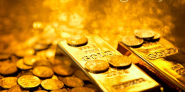 Vàng lên, đạt mức cao nhất trong một tuần khi đô la giảm 2 Hợp đồng tương lai vàng